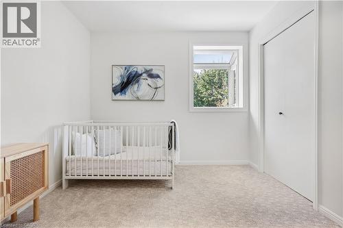 Neutral-toned wall-to-wall carpeting - 4159 Spruce Avenue, Burlington, ON 