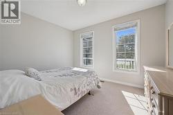 Textured carpeting and neutral wall tones - 