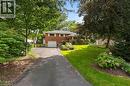 Front yard view with brick facade, paved driveway widening to double space infront of garage - 200 Woodview Crescent, Ancaster, ON 