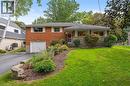 Front yard view with manicured gardens - 200 Woodview Crescent, Ancaster, ON 