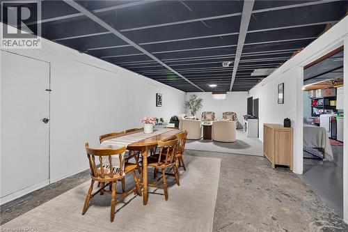 Finished basement offering a spacious layout with concrete flooring - 13 Allanburg Road S, St. Catharines, ON 