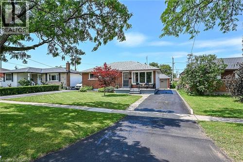 Brick exterior with a gabled roof - 13 Allanburg Road S, St. Catharines, ON 