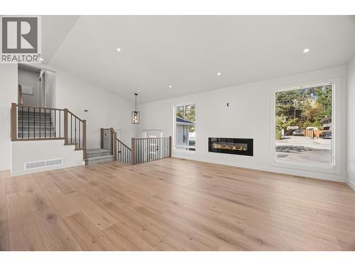 Main House Living Room - FP Virtually enhanced - 4141 San Clemente Avenue, Peachland, BC 