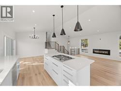 Main House Kitchen / Dining - FP Virtually enhanced - 