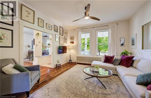 Hardwood flooring, tall windows, and a ceiling fan - 59 Allen Street W, Waterloo, ON 