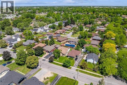 Residential neighborhood featuring mature trees and paved streets - 49 Grove Avenue, St. Catharines, ON 