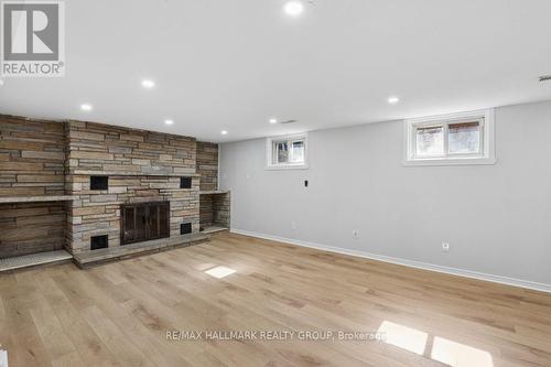 Floor to ceiling stone fireplace. - 211 Harcourt Avenue, Ottawa, ON 