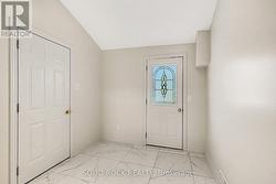 Porcelain tiles in entry. - 