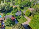 Expansive lot with mature trees, a private driveway, and a lush green lawn - 940 Harvey Place, Halton, ON 