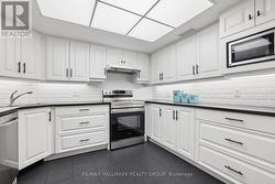 Bright Kitchen - Plenty of Storage & Counter Space - 