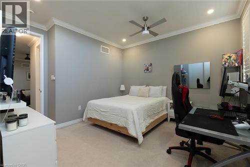 Recessed lighting, crown molding, ceiling fan, carpeting, and window with blinds - 455 Equestrian Way, Cambridge, ON 