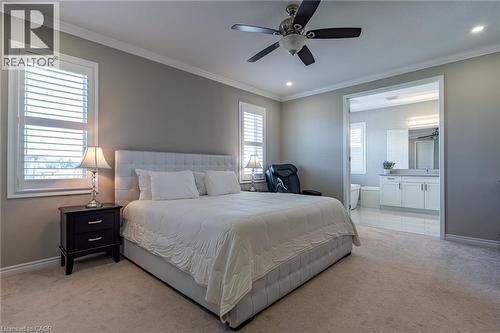 Neutral tone walls, crown molding, and recessed lighting - 455 Equestrian Way, Cambridge, ON 