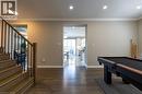 Wood-finish flooring throughout, with recessed lighting and crown molding - 455 Equestrian Way, Cambridge, ON 