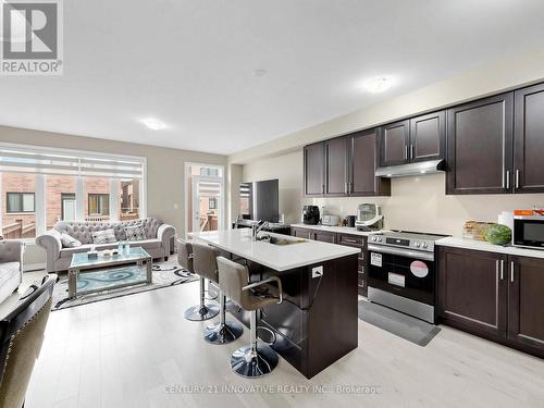 Kitchen with Breakfast Bar - 575 Boyd Lane, Milton, ON 