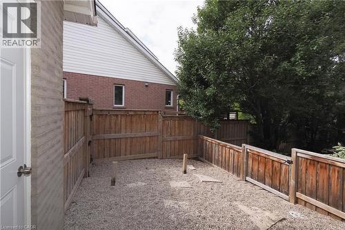 Fenced dog run (accessible off the main floor laundry room). - 76 Nith River Way, Ayr, ON 