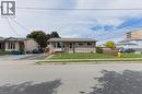 Brick exterior with a gabled roofline and front lawn - 120 Union Street S, Cambridge, ON 