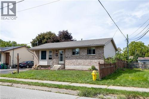 Brick and siding exterior with a shingle roof - 120 Union Street S, Cambridge, ON 