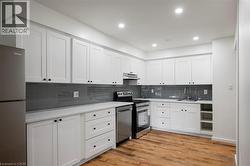 Kitchen: shaker cabinets, stainless appliances - 