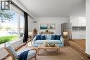 Living room, open to kitchen – virtually staged - 139 Town Line, Orangeville, ON 