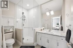 Spacious vanity with dual sinks, a large mirror, and ample under-sink storage - 