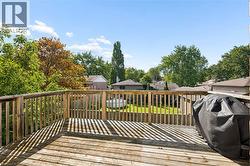 Expansive wood-plank deck with a perimeter railing - 