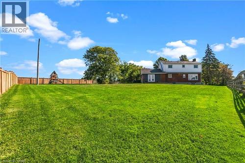 Expansive green lawn with a wood fence perimeter - 5367 2 Side Road, Milton, ON 