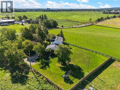 Expansive green space with a fenced perimeter and mature trees - 5367 2 Side Road, Milton, ON 