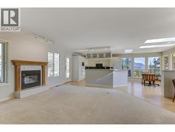 Family room with gas fireplace on the upper level - 