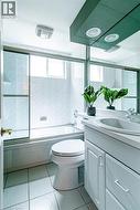 White tile flooring with a matching tub surround - 