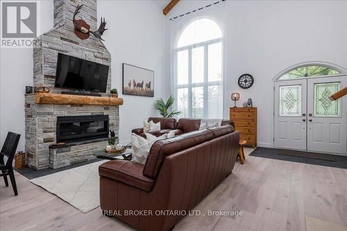 3665 Baldwick Lane, Springwater, ON - Indoor Photo Showing Living Room With Fireplace