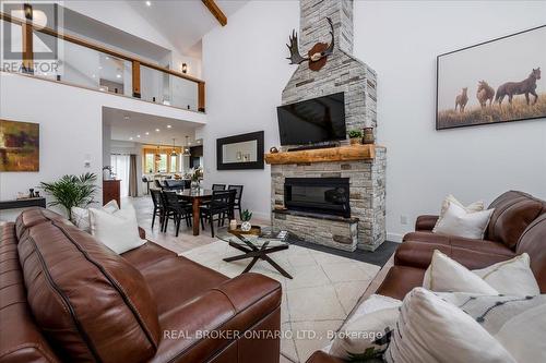 3665 Baldwick Lane, Springwater, ON - Indoor Photo Showing Living Room With Fireplace