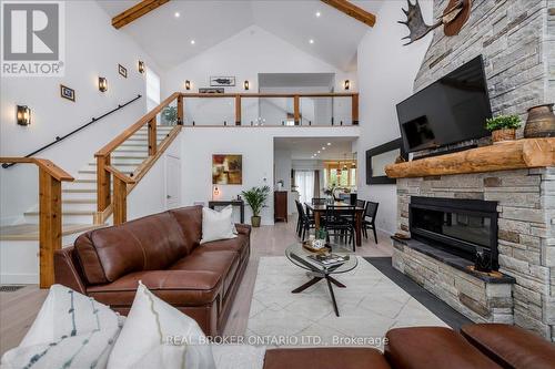 3665 Baldwick Lane, Springwater, ON - Indoor Photo Showing Living Room With Fireplace