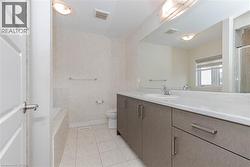 Extended vanity with a built-in sink, integrated countertop, and ample storage cabinetry - 
