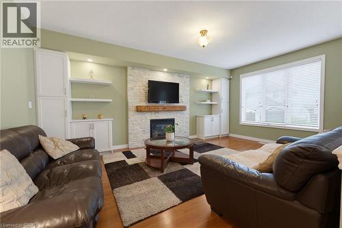 73 Degrow Crescent, Binbrook, ON - Indoor Photo Showing Living Room With Fireplace