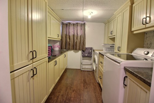 Salle de lavage - 641 2E Rue O., Barraute, QC - Indoor Photo Showing Laundry Room