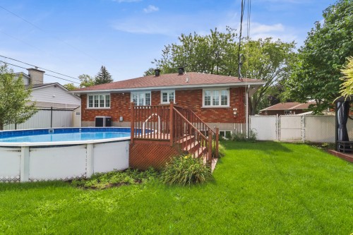 Face arrière - 64 Rue De Lorraine, Repentigny (Repentigny), QC - Outdoor With Above Ground Pool