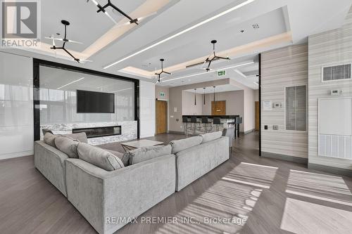 #1012 - 99 Eagle Rock Way, Vaughan, ON - Indoor Photo Showing Living Room With Fireplace