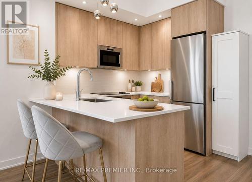 #1012 - 99 Eagle Rock Way, Vaughan, ON - Indoor Photo Showing Kitchen With Upgraded Kitchen