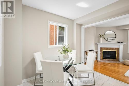 3847 Densbury Drive, Mississauga, ON - Indoor Photo Showing Dining Room With Fireplace