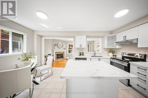 3847 Densbury Drive, Mississauga, ON - Indoor Photo Showing Kitchen With Fireplace With Stainless Steel Kitchen
