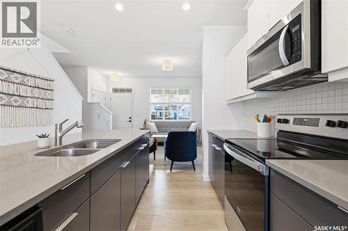 171 Taube Avenue, Saskatoon, SK - Indoor Photo Showing Kitchen With Double Sink