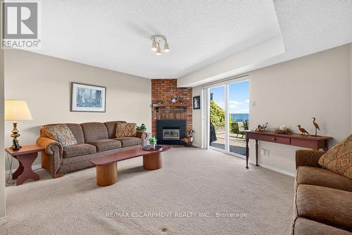 8 - 2136 Old Lakeshore Road, Burlington, ON - Indoor Photo Showing Living Room With Fireplace