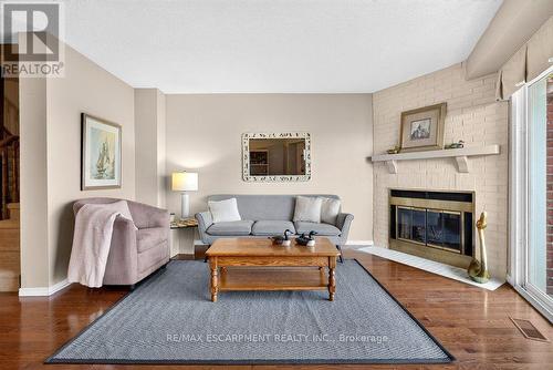 8 - 2136 Old Lakeshore Road, Burlington, ON - Indoor Photo Showing Living Room With Fireplace