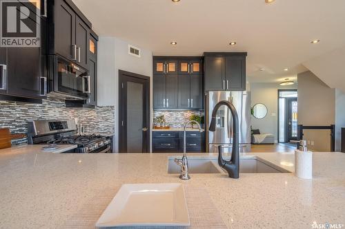 4311 Sandpiper Crescent E, Regina, SK - Indoor Photo Showing Kitchen With Stainless Steel Kitchen With Upgraded Kitchen