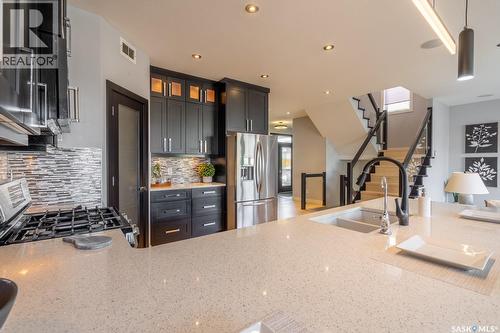 4311 Sandpiper Crescent E, Regina, SK - Indoor Photo Showing Kitchen With Stainless Steel Kitchen With Double Sink With Upgraded Kitchen