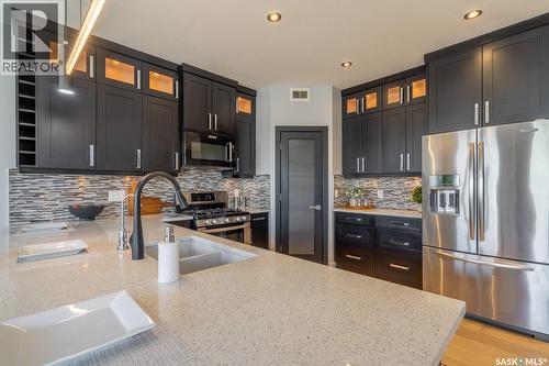 4311 Sandpiper Crescent E, Regina, SK - Indoor Photo Showing Kitchen With Stainless Steel Kitchen With Double Sink With Upgraded Kitchen