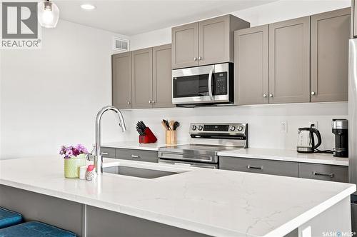 110 Cowessess Road, Saskatoon, SK - Indoor Photo Showing Kitchen With Upgraded Kitchen