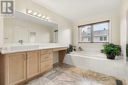 Large primary bedroom bathroom - 