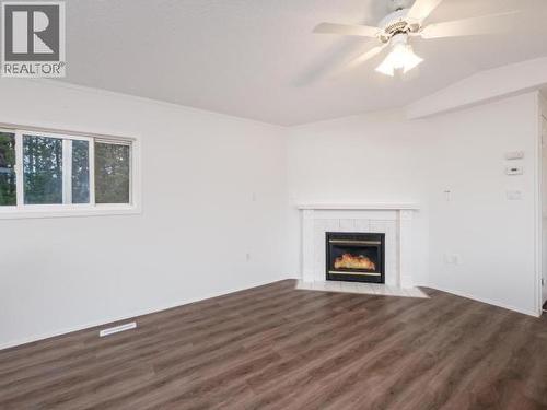 413-989 Range Road, Whitehorse, YT - Indoor Photo Showing Living Room With Fireplace