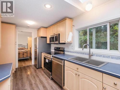 413-989 Range Road, Whitehorse, YT - Indoor Photo Showing Kitchen With Double Sink